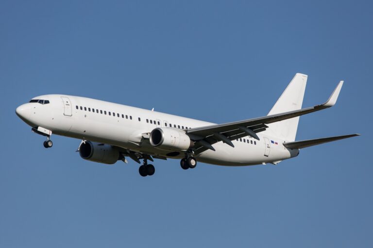 Full white neutralized airliner Boeing 737-800 of slovakian Carr